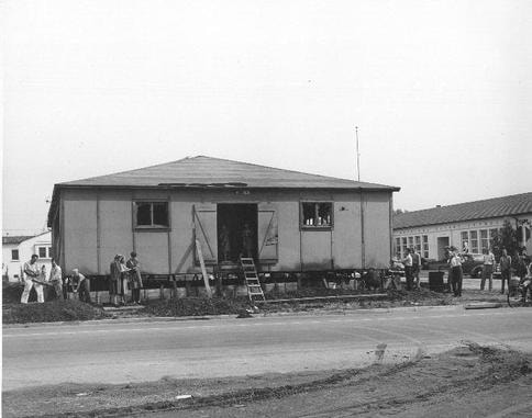 Building moving day in 1944, moved from 2 blocks south near the old train tracks.